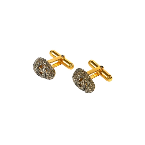 17 - A PAIR OF SKELETON CUFFLINKS SET WITH ROSE CUT DIAMONDS.  
(Approx Diamonds 1.80ct)