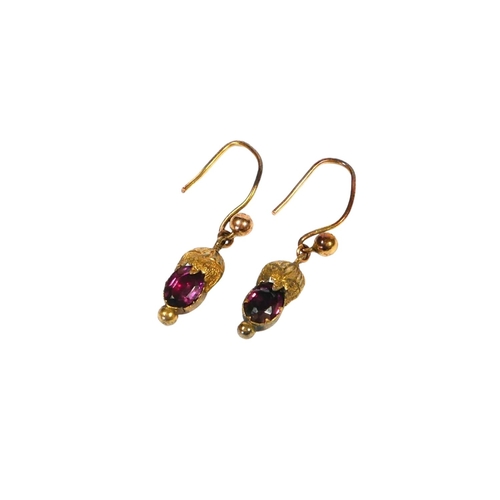 3A - A PAIR OF VICTORIAN YELLOW METAL AND GARNET EARRINGS, YELLOW METAL TESTED AS 9CT GOLD
Oval cut garne... 