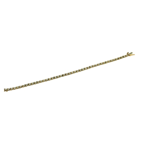 50 - A 9CT GOLD AND DIAMOND TENNIS BRACELET
Having forty-six round cut diamonds (approx 1mm diameter) in ... 