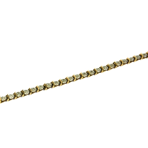 50 - A 9CT GOLD AND DIAMOND TENNIS BRACELET
Having forty-six round cut diamonds (approx 1mm diameter) in ... 