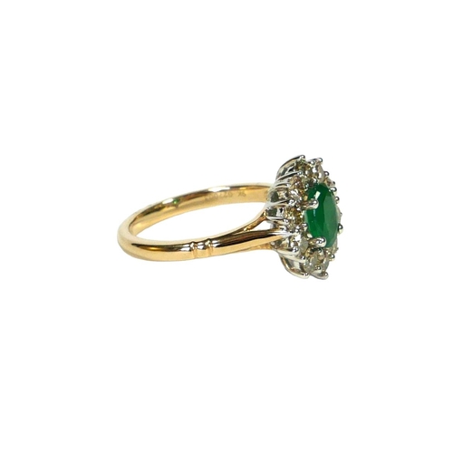 9A - A 9CT WHITE AND YELLOW GOLD, EMERALD AND DIAMOND CLUSTER RING.
(Approx Emerald 0.85ct.  Diamonds 0.9... 