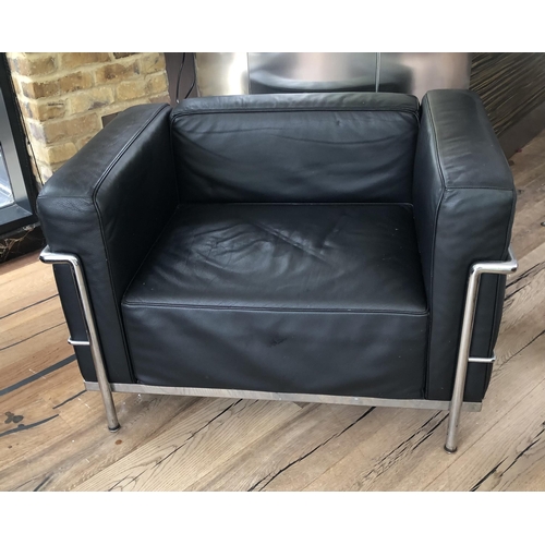 554 - A PAIR OF BLACK LEATHER LE CORBUSIER STYLE ARMCHAIRS
Condition good some light marks
90 x 75 x 70cm