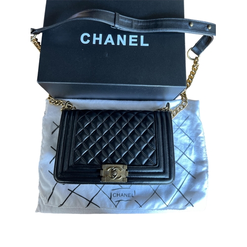 100A - CHANEL, BOY BLACK QUILTED LEATHER CROSSBODY BAG
With signature ‘CC’ logo clasp at the front, in orig... 