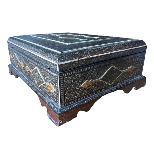 156 - A 19TH CENTURY OTTOMAN EMPIRE LACQUERED WOOD BOX
inlaid with bone and gilt metal geometrical star de... 