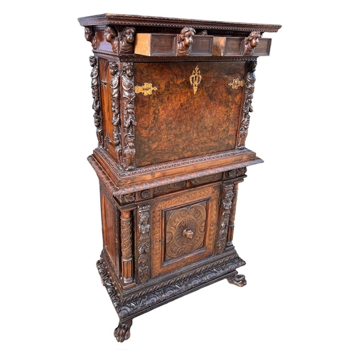 158 - A 17TH/18TH CENTURY ITALIAN CARVED WALNUT AND BURR WALNUT BAMBOCCI CABINET 
With two single drawer a... 