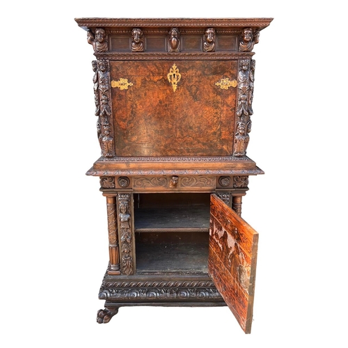 158 - A 17TH/18TH CENTURY ITALIAN CARVED WALNUT AND BURR WALNUT BAMBOCCI CABINET 
With two single drawer a... 