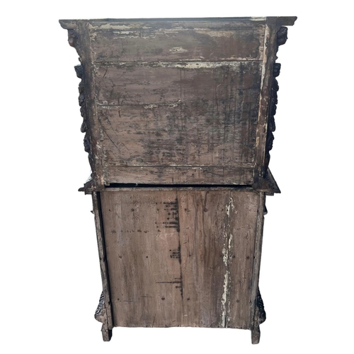 158 - A 17TH/18TH CENTURY ITALIAN CARVED WALNUT AND BURR WALNUT BAMBOCCI CABINET 
With two single drawer a... 