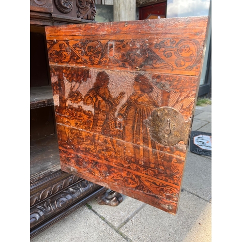 158 - A 17TH/18TH CENTURY ITALIAN CARVED WALNUT AND BURR WALNUT BAMBOCCI CABINET 
With two single drawer a... 