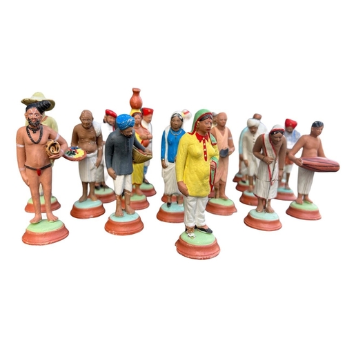 55A - A LATE 19TH/EARLY 20TH CENTURY COLLECTION OF INDIAN PAINTED CLAY FIGURES. (average h 10.8cm)