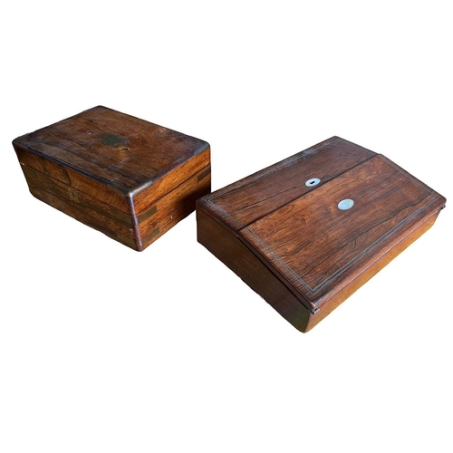 75 - A 19TH CENTURY ROSEWOOD AND BRASS INLAID WRITING SLOPE 
Opening to reveal fitted interior and two in... 