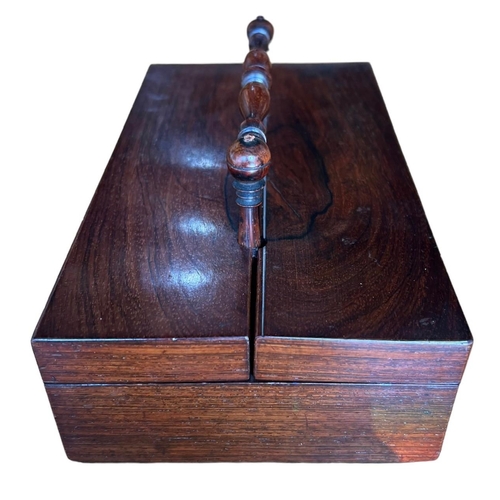 77 - A 19TH CENTURY REGENCY ROSEWOOD DESKTOP WRITTEN BOX
With turned handle opening to reveal fitted inte... 