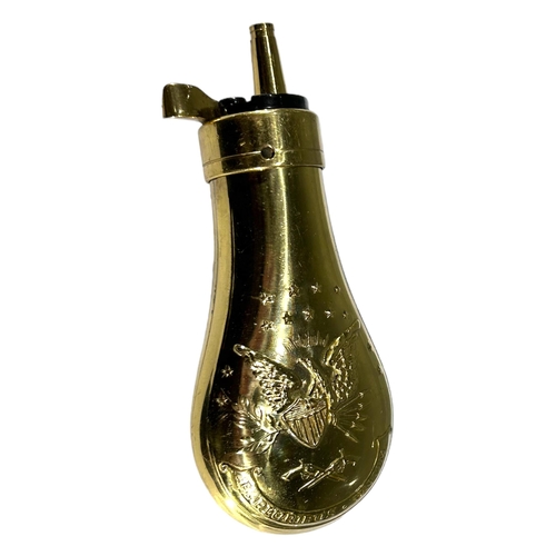 83 - A LATE 19TH EARLY 20TH CENTURY BRASS BULLET MOULD, TOGETHER WITH A LATER AMERICAN POWDER FLASK. 
(ap... 