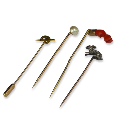 20B - A COLLECTION OF FIVE VICTORIAN AND EDWARDIAN GOLD STICK PINS, EQUESTRIAN AND HUNTING INTEREST
To inc... 