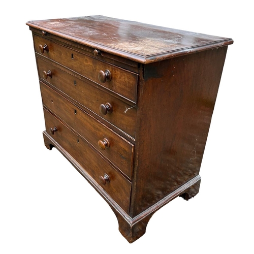 160 - A GEORGE III MAHOGANY BACHELOR’S CHEST
Of four long graduated drawers with brushing slid,. raised on... 