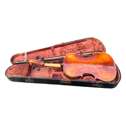 57A - A 20TH CENTURY VIOLIN AND BOW HOUSED IN A 19TH CENTURY WOODEN AND BRASS CASE
Inside label reading ‘A... 