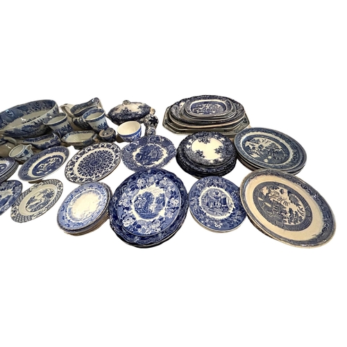 63A - A LARGE COLLECTION OF 19TH AND 20TH CENTURY BLUE AND WHITE PLATTERS, VASES, BOWLS ETC, MAJORITY BEIN... 