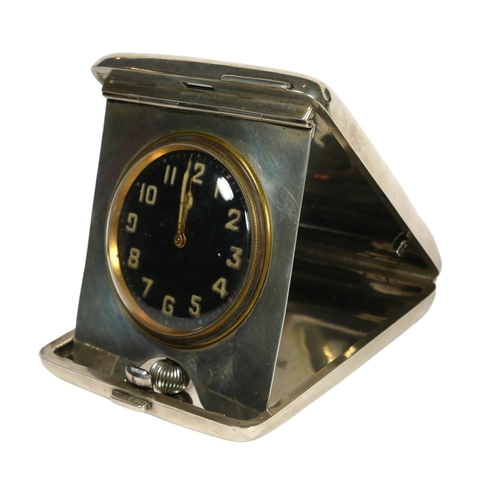 24B - ROBINSON & CO., A LARGE ART DECO SILVER CASED TRAVELING CLOCK, HALLMARKED LONDON, 1919
Having black ... 