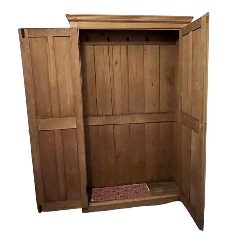 164 - AN EARLY 19TH CENTURY VICTORIAN STRIP AND WAXED PINE TWO DOOR HALL CUPBOARD.
(h 210cm x d 37cm x w 1... 