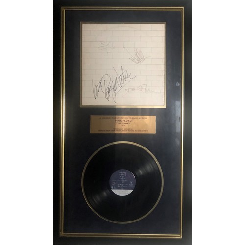 557 - PINK FLOYD, THE WALL 1979
A personally signed album, David Gilmour, Nick Mason, Rodger Waters & Rich... 