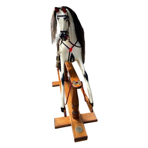 68 - ROCKING HORSE SHOP, A LARGE DECORATIVE CARVED WOOD DAPPLED ROCKING HORSE, with glass eyes leather sa... 