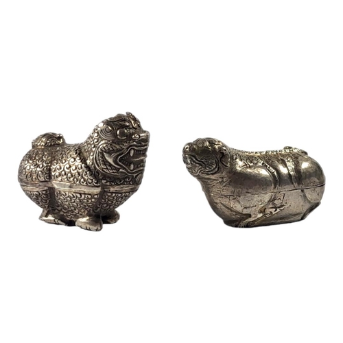 109 - TWO LATE 19TH/EARLY 20TH CENTURY CAMBODIAN SILVER LION DOG BETEL BOXES
Having chased textured decora... 