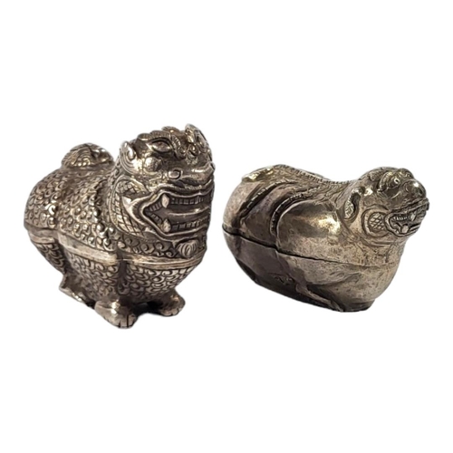 109 - TWO LATE 19TH/EARLY 20TH CENTURY CAMBODIAN SILVER LION DOG BETEL BOXES
Having chased textured decora... 