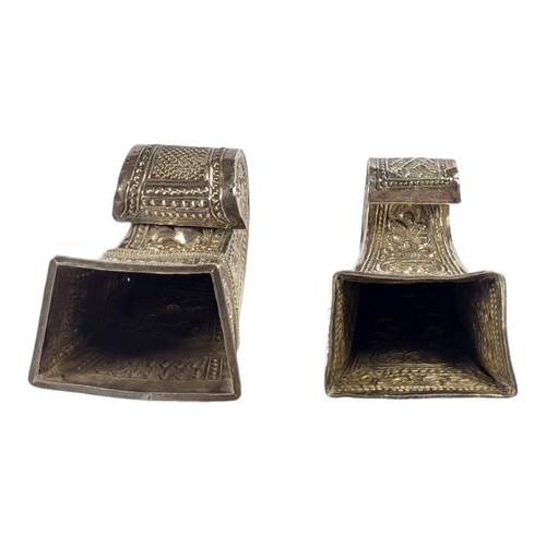 111 - TWO LATE 19TH/EARLY 20TH CENTURY BURMESE SILVER BETEL LEAF HOLDERS
Both having intricate chased and ... 