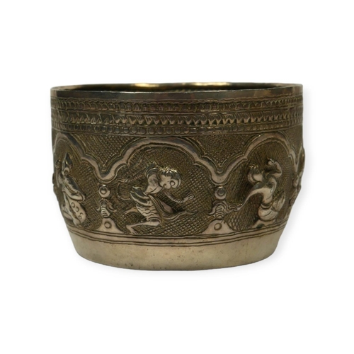 112 - A LATE 19TH/EARLY 20TH CENTURY BURMESE SILVER BOWL
Decorated with seven repoussé cartouches depictin... 