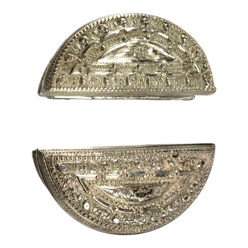 114 - TWO LATE 19TH/EARLY 20TH CENTURY BURMESE SILVER LIME BOX OF DEMILUNE FORM
First having alternating c... 