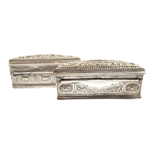 114 - TWO LATE 19TH/EARLY 20TH CENTURY BURMESE SILVER LIME BOX OF DEMILUNE FORM
First having alternating c... 