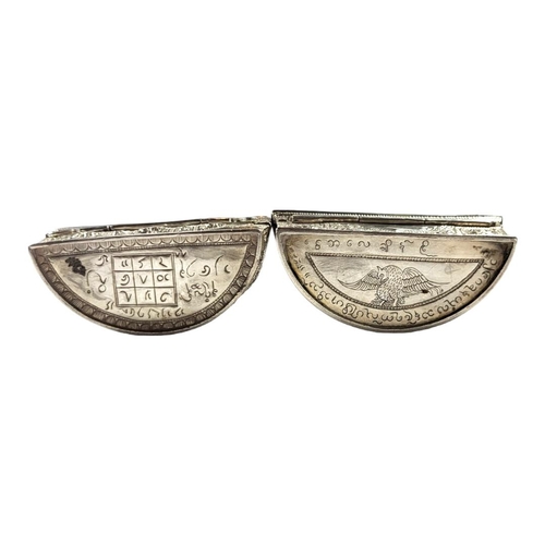 114 - TWO LATE 19TH/EARLY 20TH CENTURY BURMESE SILVER LIME BOX OF DEMILUNE FORM
First having alternating c... 