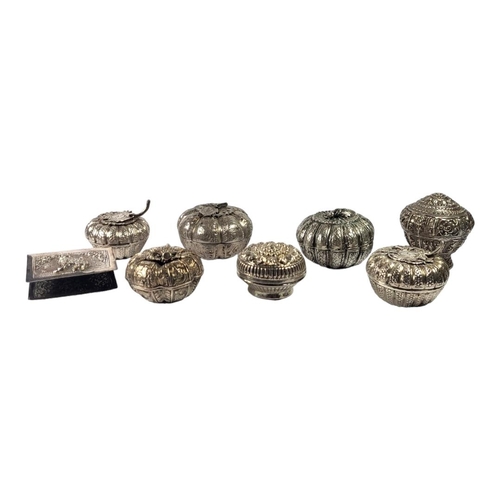 117 - COLLECTION OF SEVEN LATE 19TH/EARLY 20TH CENTURY BURMESE SILVER BETEL BOXES, MOSTLY IN THE FORM OF P... 