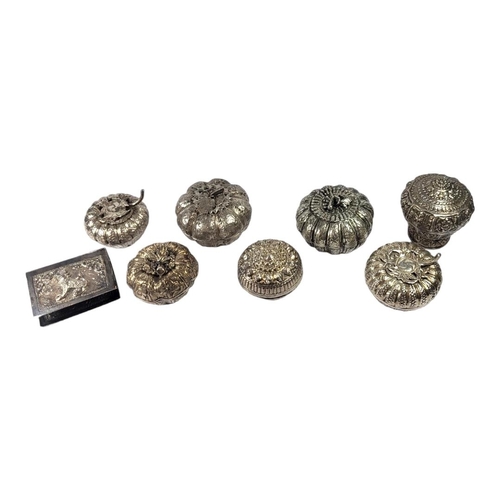 117 - COLLECTION OF SEVEN LATE 19TH/EARLY 20TH CENTURY BURMESE SILVER BETEL BOXES, MOSTLY IN THE FORM OF P... 