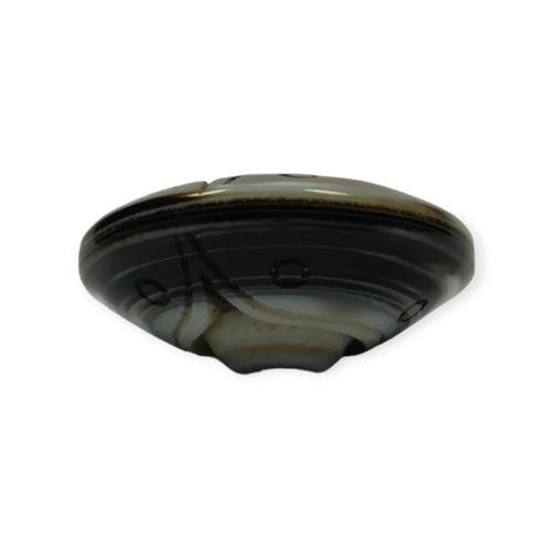 134 - TIBETAN CARVED AGATE BUDDHIST HEAVEN EYE PENDANT.

Provenance: private collection of a gentleman