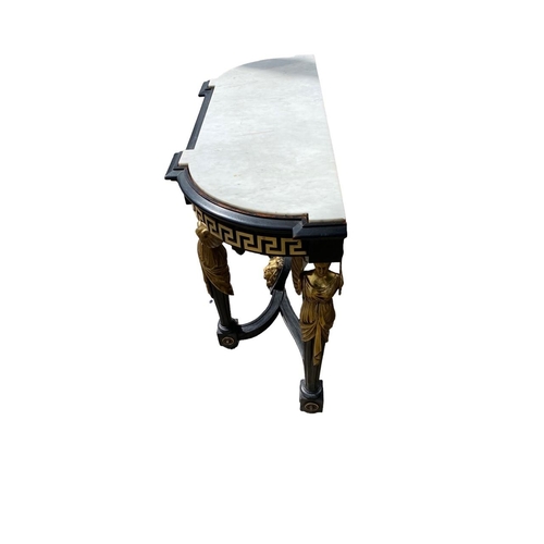 221 - A 19TH CENTURY NEOCLASSICAL DESIGN EBONISED AND GILT METAL MOUNTED CONSOLE TABLE
The white marble to... 
