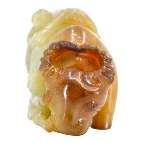 120 - A CHINESE PALE GREEN AND RUSSET JADE ‘BOYS & BUFFALO’ CARVING
Recumbent water buffalo carved with tw... 