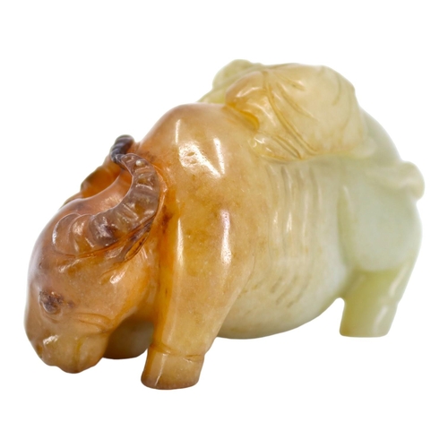 120 - A CHINESE PALE GREEN AND RUSSET JADE ‘BOYS & BUFFALO’ CARVING
Recumbent water buffalo carved with tw... 