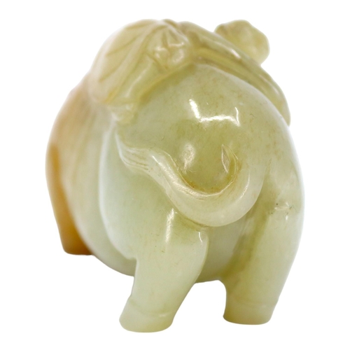 120 - A CHINESE PALE GREEN AND RUSSET JADE ‘BOYS & BUFFALO’ CARVING
Recumbent water buffalo carved with tw... 