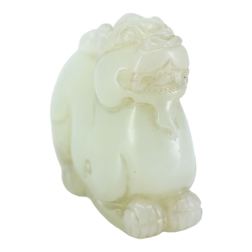 124 - A CHINESE WHITE JADE CARVING OF A QILIN
The mythical beast is nicely carved and pierced underneath h... 