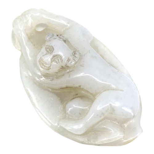 127 - A CHINESE WHITE JADE ‘BOY ON LEAF’ CARVED PENDANT
The pendant depicting a boy clinging onto the stem... 