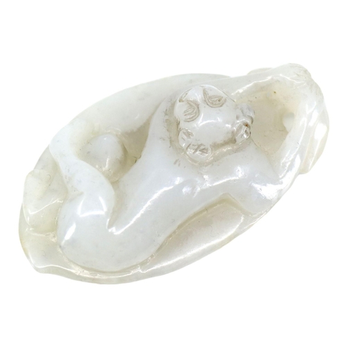 127 - A CHINESE WHITE JADE ‘BOY ON LEAF’ CARVED PENDANT
The pendant depicting a boy clinging onto the stem... 