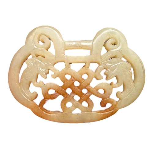 132 - A LARGE CHINESE HETIAN JADE PENDANT HAVING CARVED PIERCED DECORATION.
(w 8.7cm)