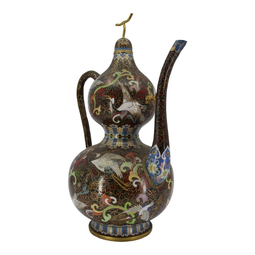 136 - A LARGE CHINESE CLOISONNÉ ENAMEL DOUBLE GOURD EWER AND COVER
Having serpentine spout and handle, dec... 