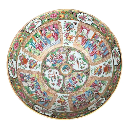 139 - A LARGE EARLY 19TH CENTURY CHINESE CANTON FAMILLE ROSE BOWL
Circular form having multiples panels sh... 
