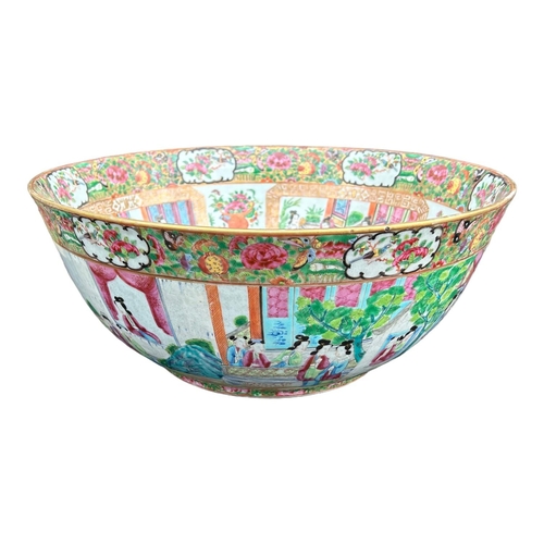 139 - A LARGE EARLY 19TH CENTURY CHINESE CANTON FAMILLE ROSE BOWL
Circular form having multiples panels sh... 