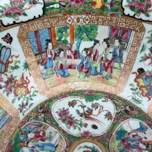 139 - A LARGE EARLY 19TH CENTURY CHINESE CANTON FAMILLE ROSE BOWL
Circular form having multiples panels sh... 