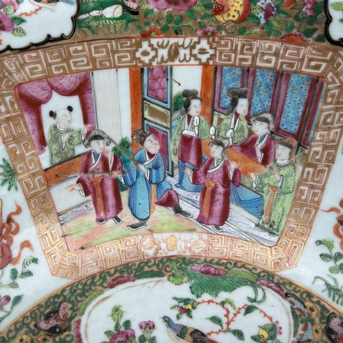 139 - A LARGE EARLY 19TH CENTURY CHINESE CANTON FAMILLE ROSE BOWL
Circular form having multiples panels sh... 