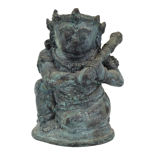 145 - AN INDONESIAN, JAVANESE FIGURE OF BATHARA KALA/BHOMA
Holding a gada (cudgel). 
(h 13.5cm x w 10.5cm ... 