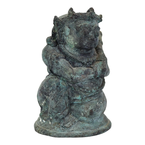 145 - AN INDONESIAN, JAVANESE FIGURE OF BATHARA KALA/BHOMA
Holding a gada (cudgel). 
(h 13.5cm x w 10.5cm ... 