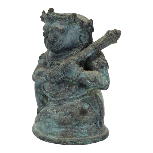 145 - AN INDONESIAN, JAVANESE FIGURE OF BATHARA KALA/BHOMA
Holding a gada (cudgel). 
(h 13.5cm x w 10.5cm ... 